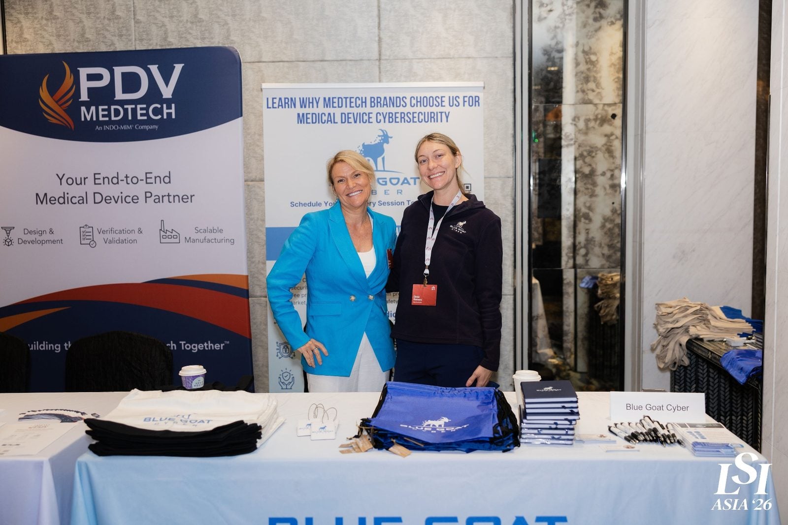 Melissa Espinosa and Dixie Reeves at the Blue Goat Cyber booth at LSI Asia '26 in Singapore