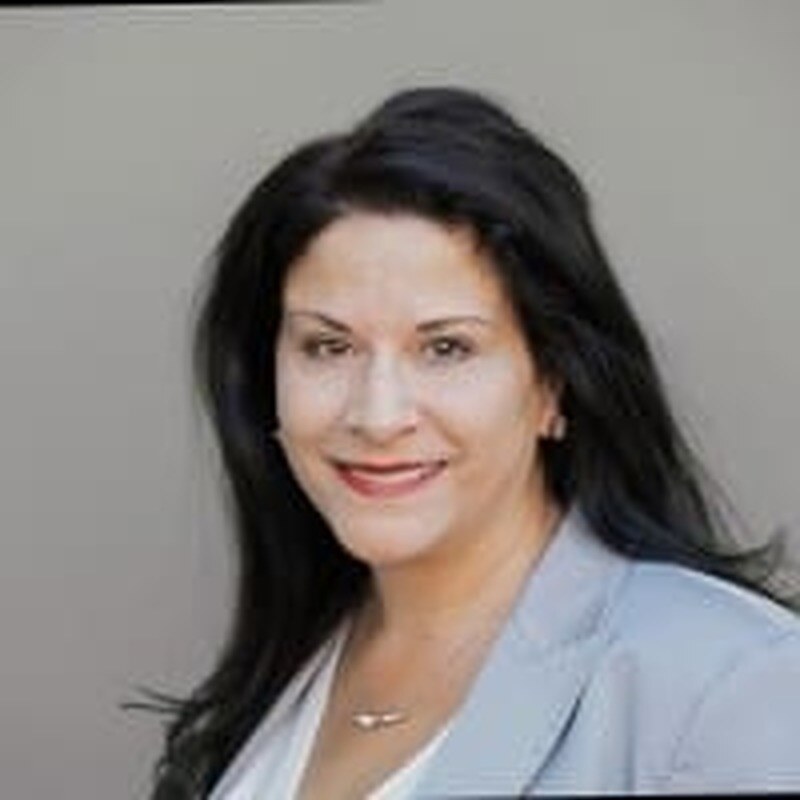 Headshot of Kristy Kennedy, VP, Sales at Blue Goat Cyber