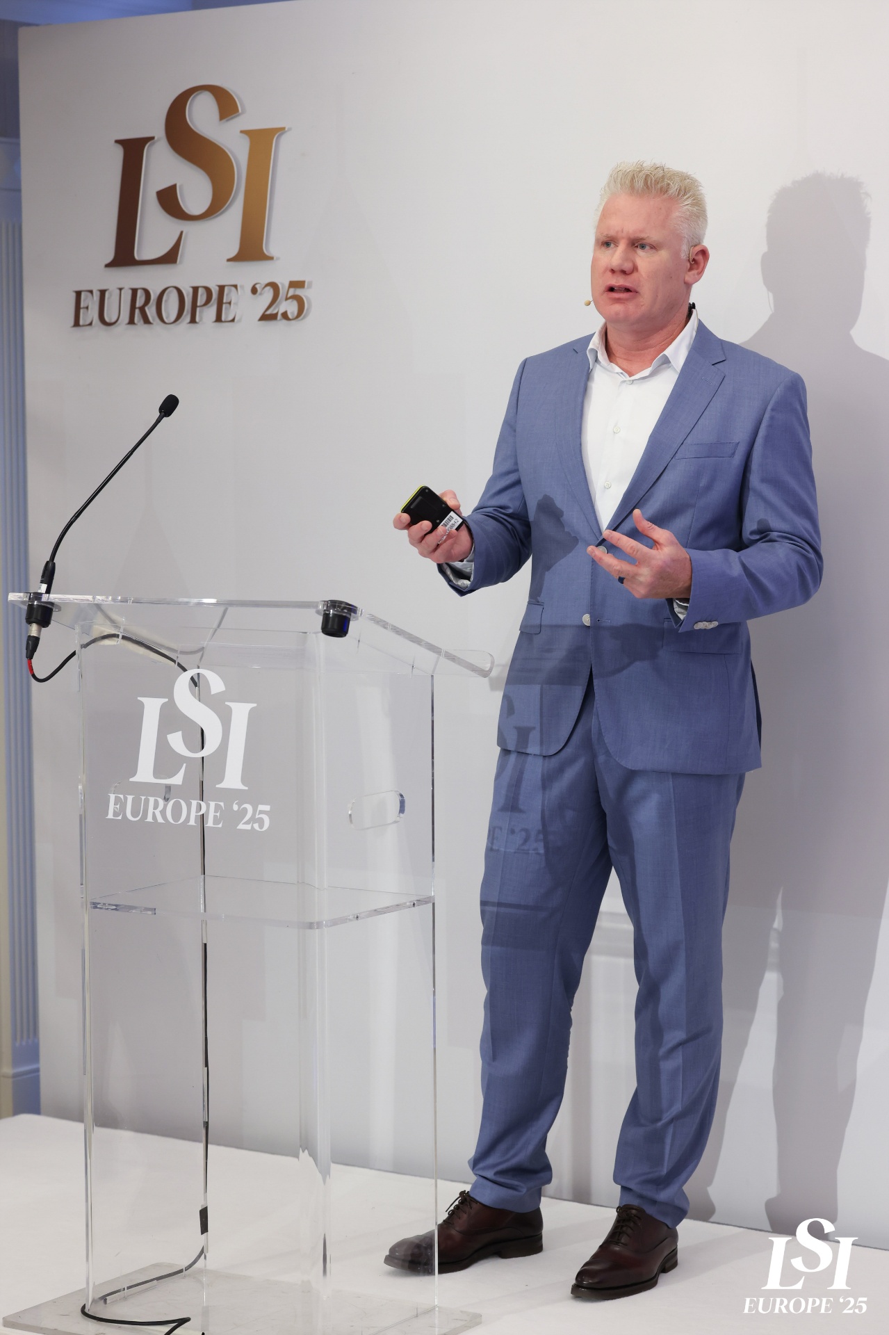 Christian Espinosa presenting on stage at LSI Europe '25