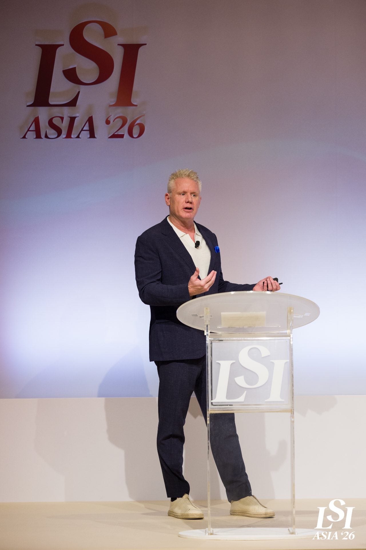 Christian Espinosa on stage at the LSI Asia '26 podium in Singapore
